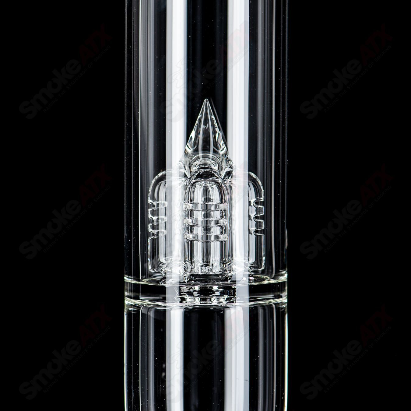 Clear 180 grid cap with reduction from Sovereignty Glass, showcasing a detailed heady glass piece with intricate design elements.