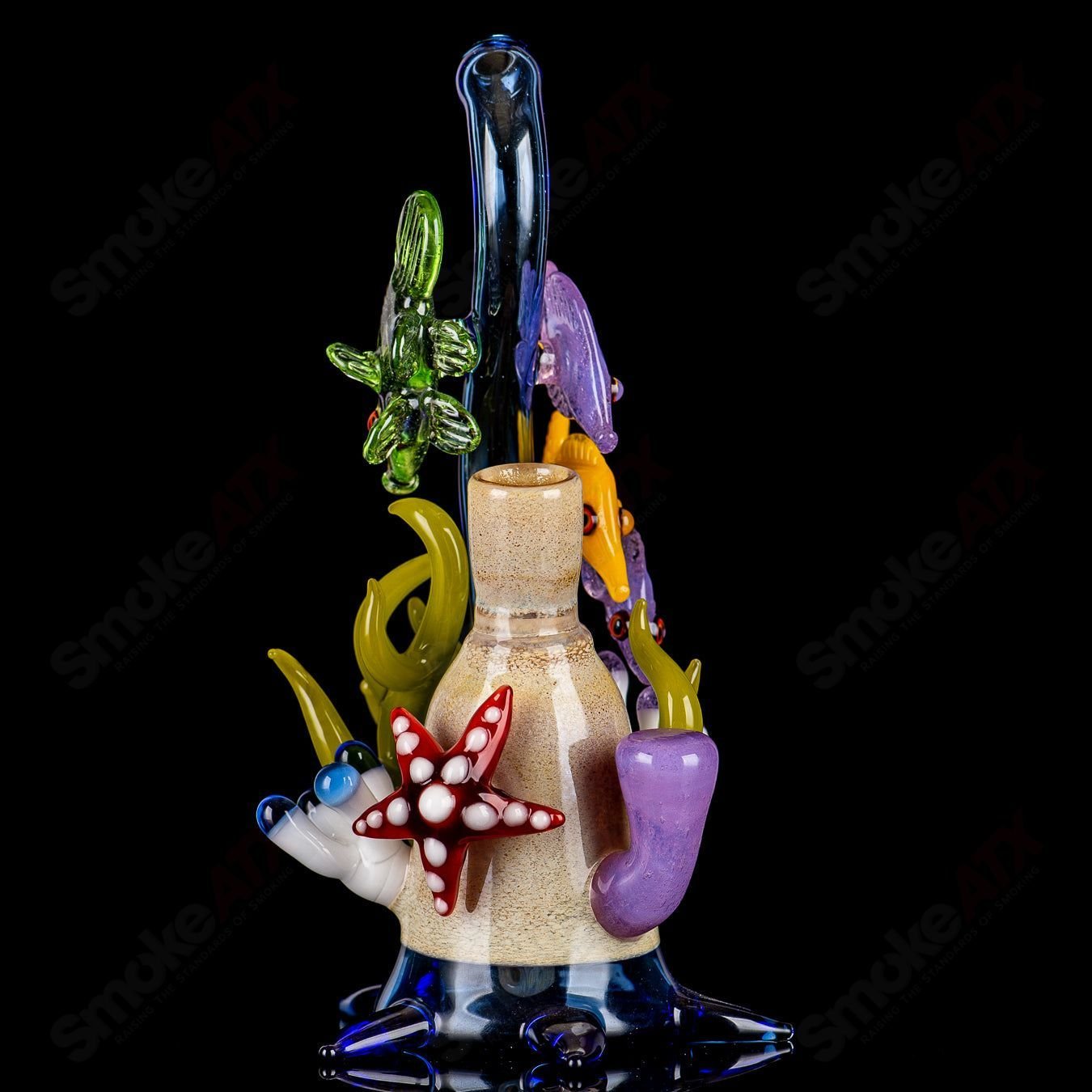 Cobalt Reef Rig by JRod Glass, a heady glass concentrate rig with vibrant cobalt blue accents and intricate glasswork.