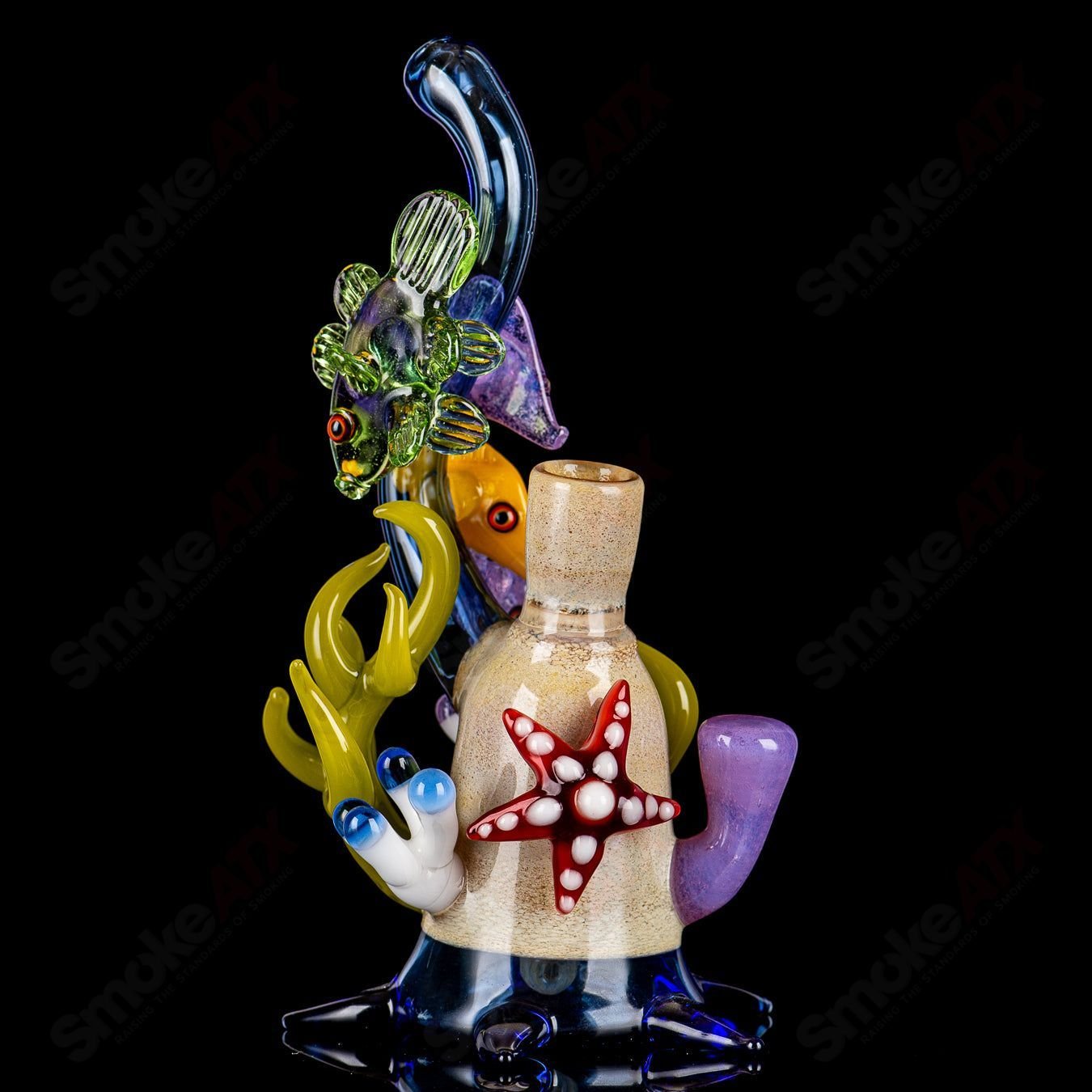 Cobalt Reef Rig JRod Heady Glass concentrate rig with vibrant blue and clear glass design, featuring intricate details and a sturdy base.