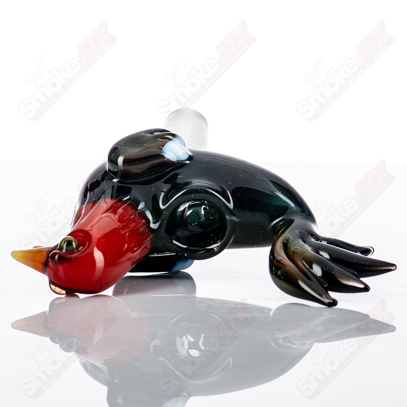Burtoni Glass cock bowl slide with clear glass design, detailed craftsmanship, and smooth finish for use in smoking apparatus.