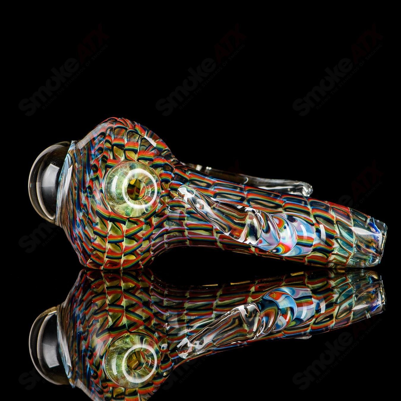 Color ribbon coil-wrap glass spoon pipe with clear horn accents and spiral design, signed by JMK Glass.