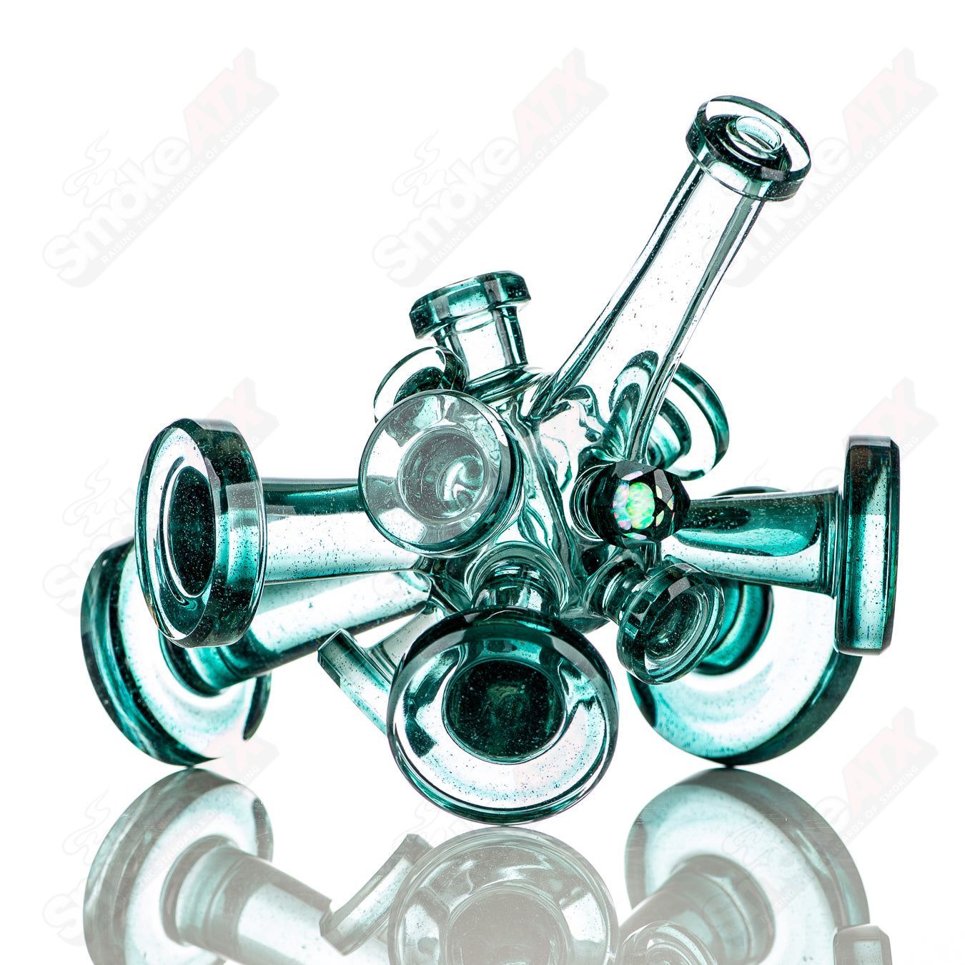 Color Spore Rig by JMass, a heady glass concentrate rig with vibrant, multicolored spore design and intricate glasswork.
