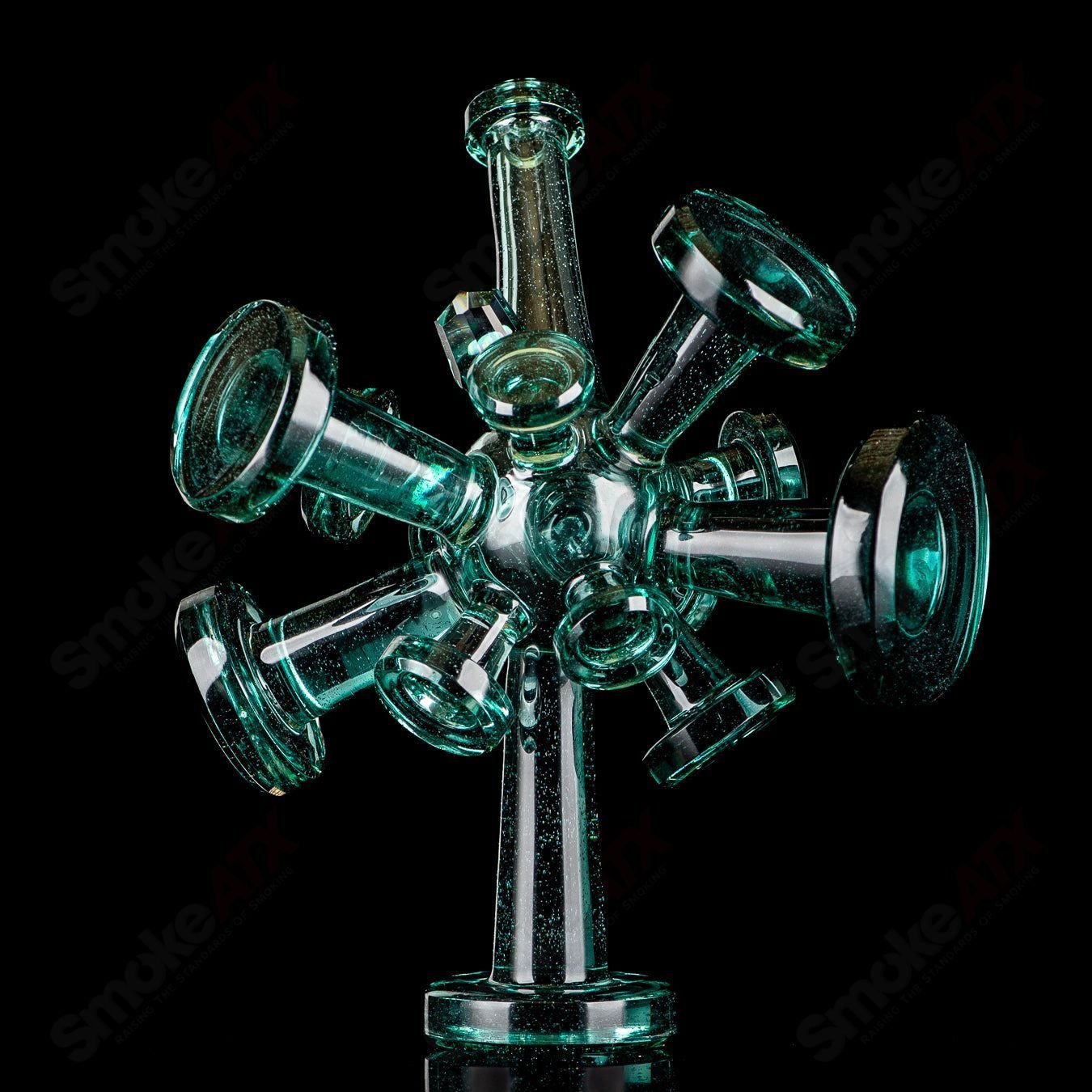 Color Spore Rig by JMass, a vibrant heady glass concentrate rig with colorful spore-like patterns and intricate design details.