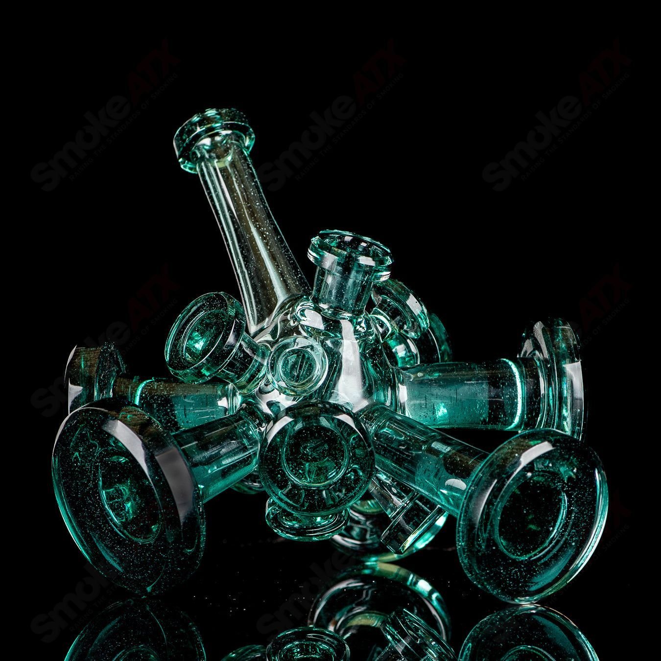 Color Spore Rig by JMass, a vibrant heady glass concentrate rig with colorful, intricate designs for dabbing and concentrates.
