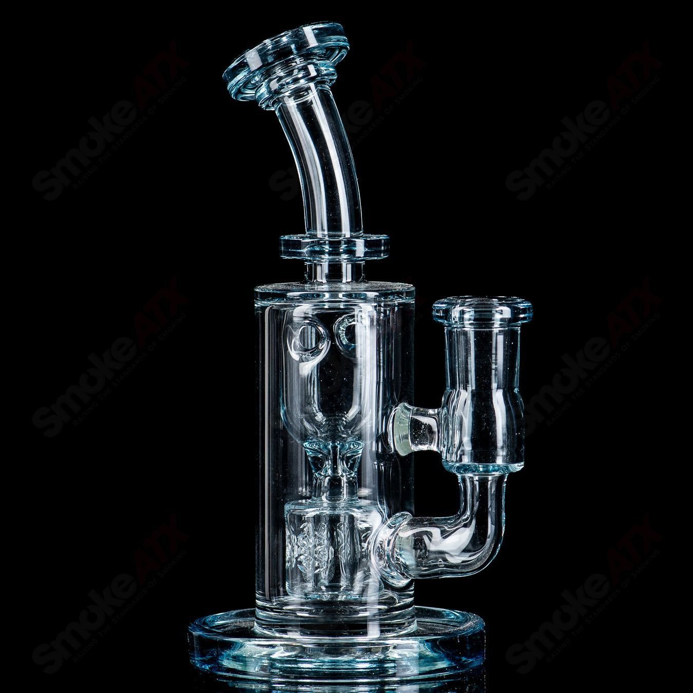 Color Taurus Mini Fat Boy Glass concentrate rig with vibrant colors and intricate design, by Fat Boy Glass.