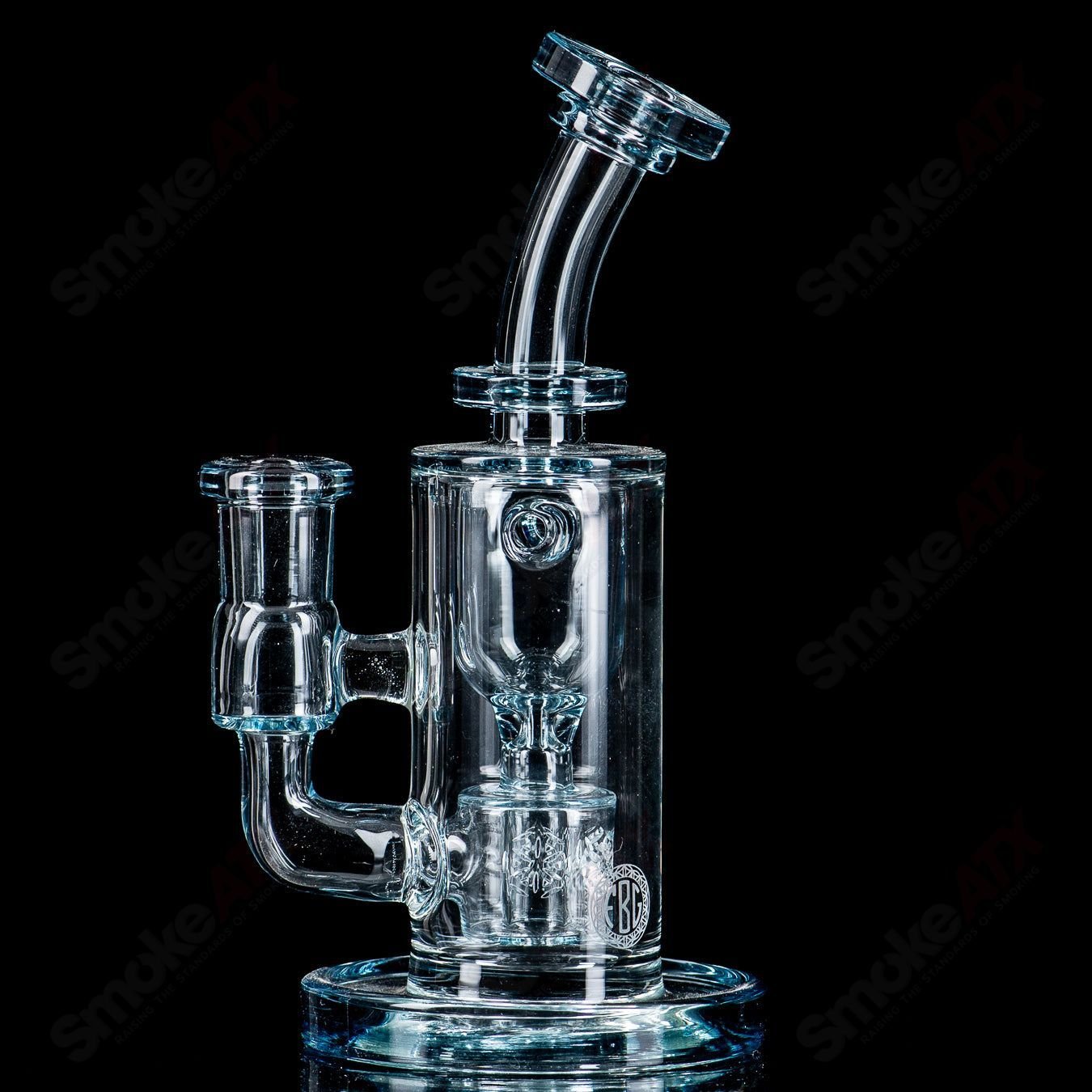 Color Taurus Mini Fat Boy Glass concentrate rig with vibrant design and sturdy glass construction from Fat Boy Glass.