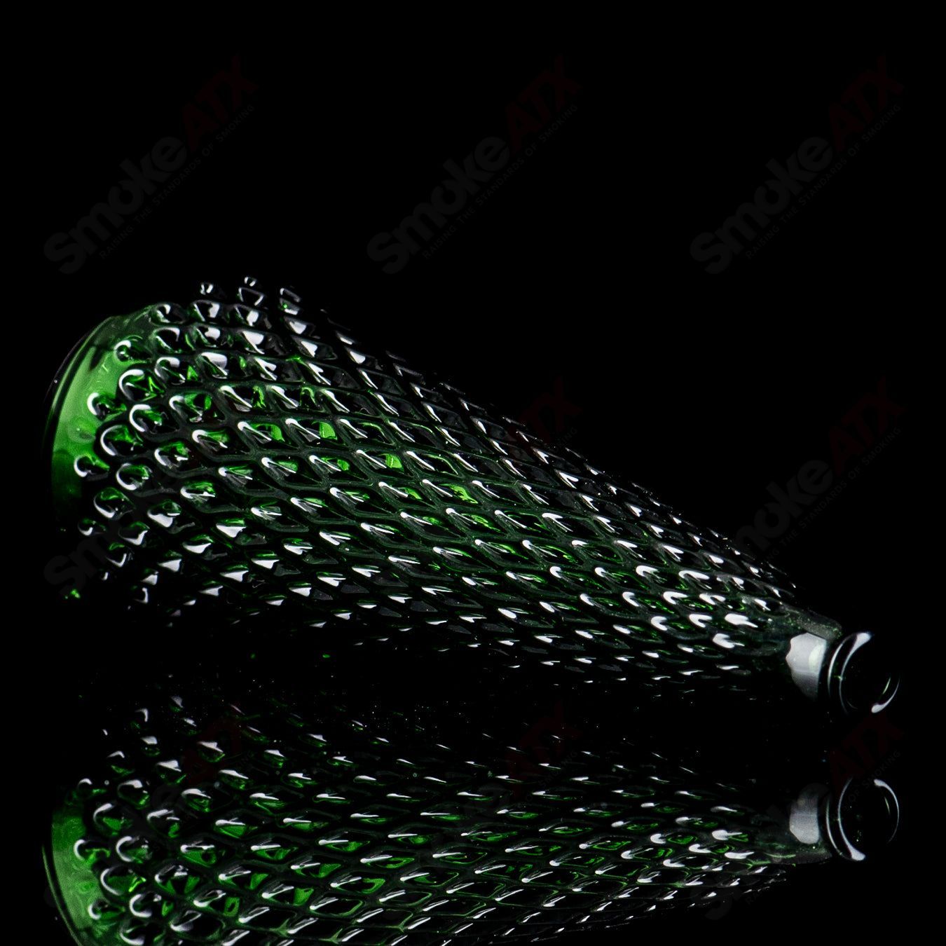 Emerald green diamond tech dry Puffco top by James Lang, made of glass, featuring a cone shape and intricate design.