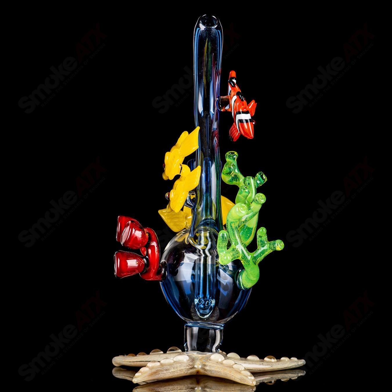 JRod Glass Coral Reef Rig Heady Glass concentrate rig with vibrant coral reef design and clear glass construction.