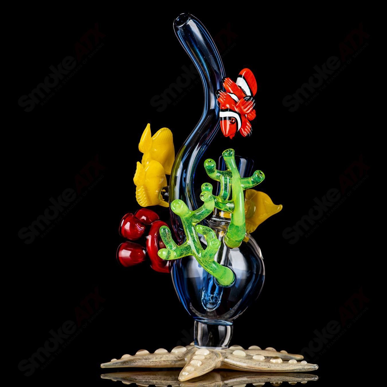 JRod Glass Coral Reef Rig Heady Glass concentrate rig with colorful coral reef design and sturdy glass construction.