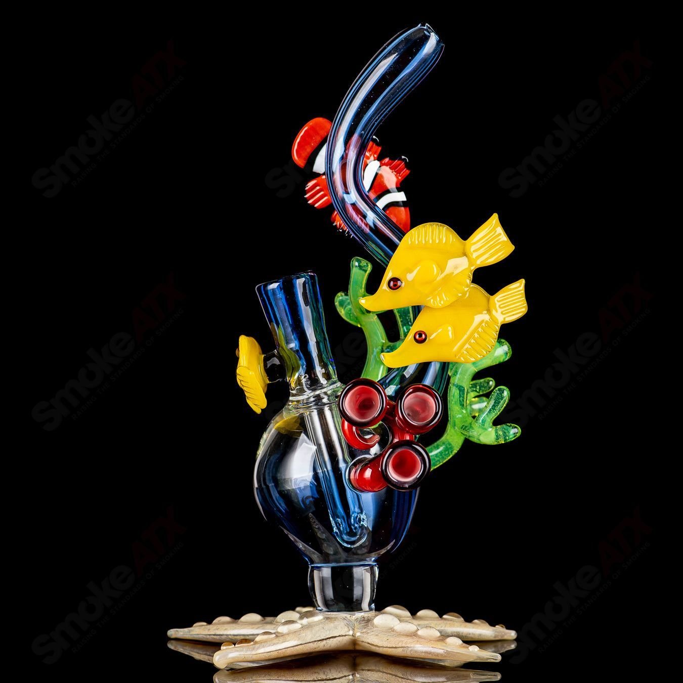 JRod Glass Coral Reef Rig, a colorful heady glass concentrate rig with vibrant coral reef design, compact and stylish for dabbing.