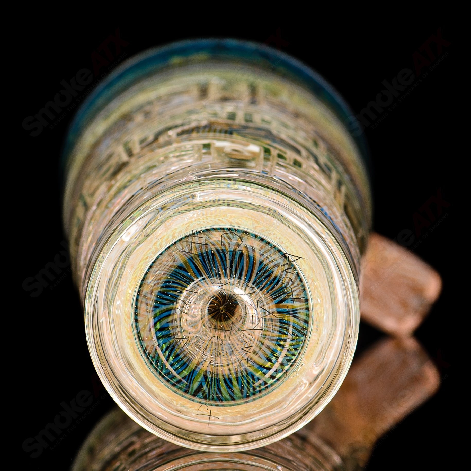 Avant-Garde Chewy Tesseract drinking cup with built-in straw, featuring a unique heady glass design and modern, avant-garde style.