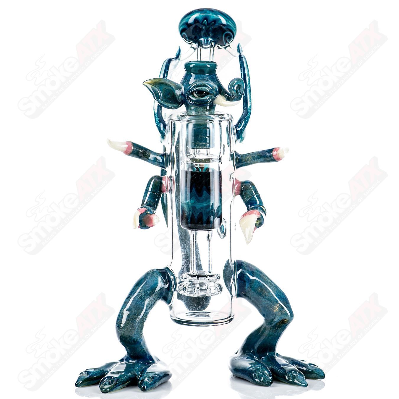 Creature Rig by E. Ross X Salt, a colorful heady glass concentrate rig with intricate creature design and textured details.