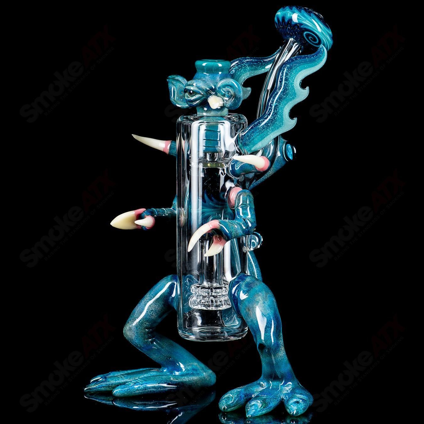 Salt Creature Rig by E. Ross, a heady glass concentrate rig featuring a detailed creature design and vibrant glasswork.