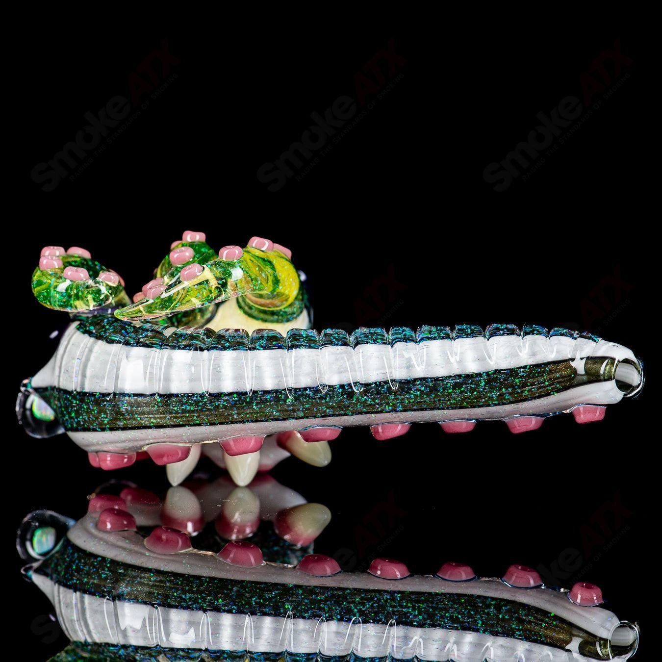 Dichro Monster Sherlock heady glass pipe signed by Harold Ludeman, featuring vibrant colors and intricate glasswork by Salt Glass.