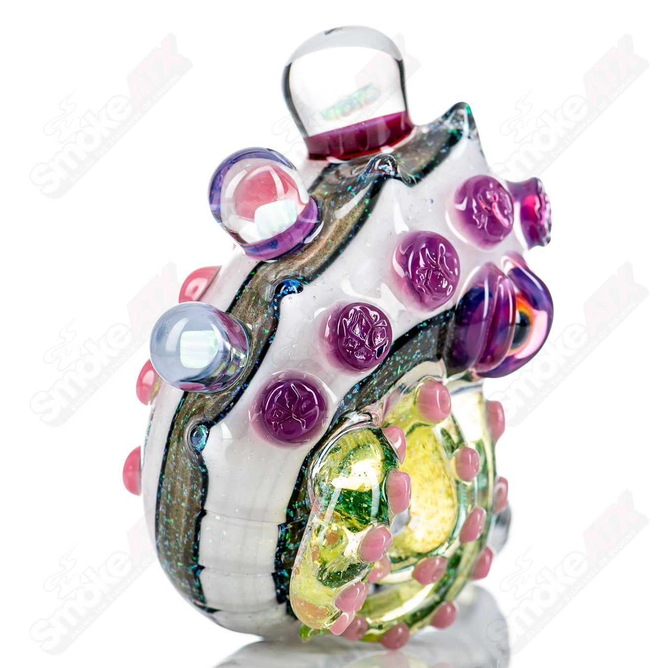 Dichro Monster Sherlock heady glass pipe signed by Harold Ludeman, featuring vibrant colors and detailed Sherlock design by Salt Glass