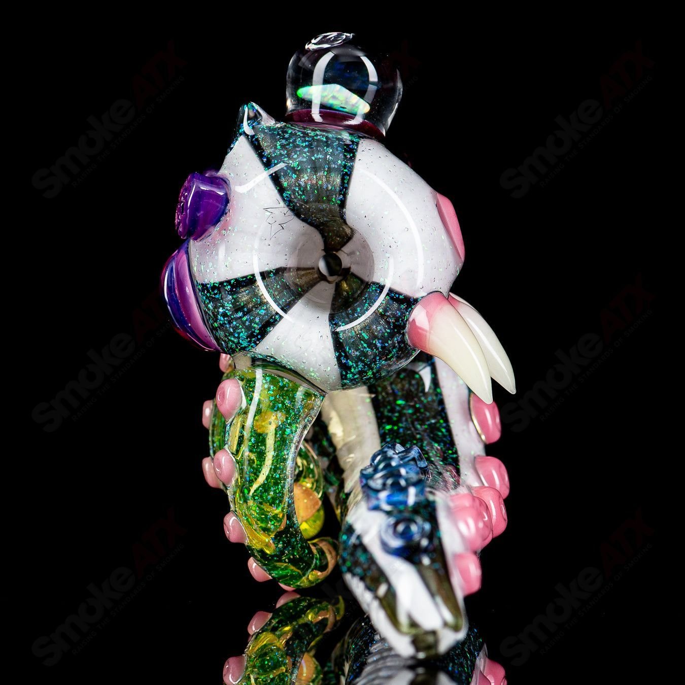 Dichro Monster Sherlock heady glass pipe signed by Harold Ludeman, featuring vibrant colors and intricate glasswork from Salt Glass.