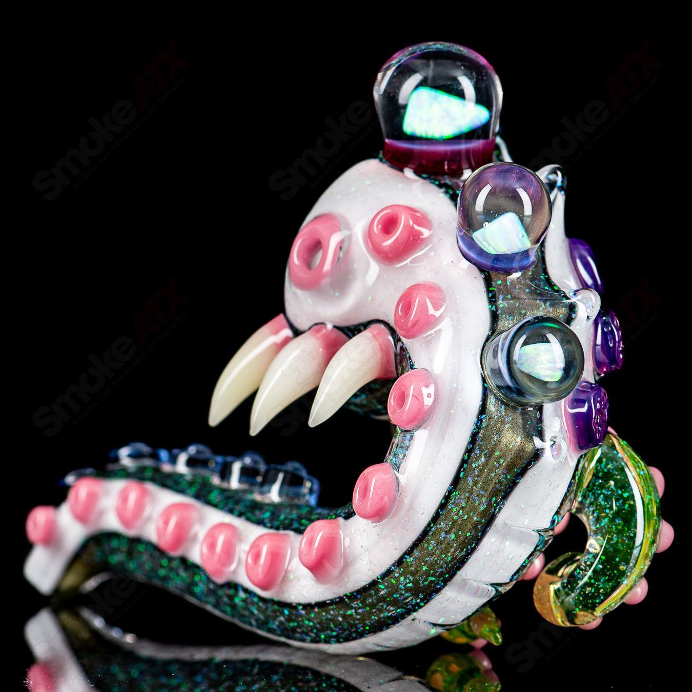 Dichro Monster Sherlock heady glass pipe signed by Harold Ludeman, featuring vibrant colors and intricate glasswork from Salt Glass.