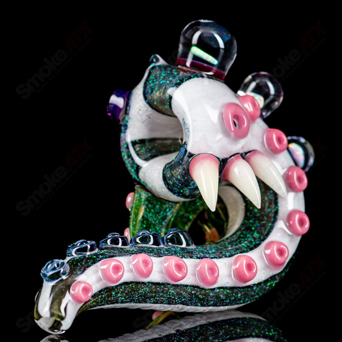 Dichro Monster Sherlock heady glass pipe signed by Harold Ludeman, produced by Salt Glass, with vibrant colors and intricate design.