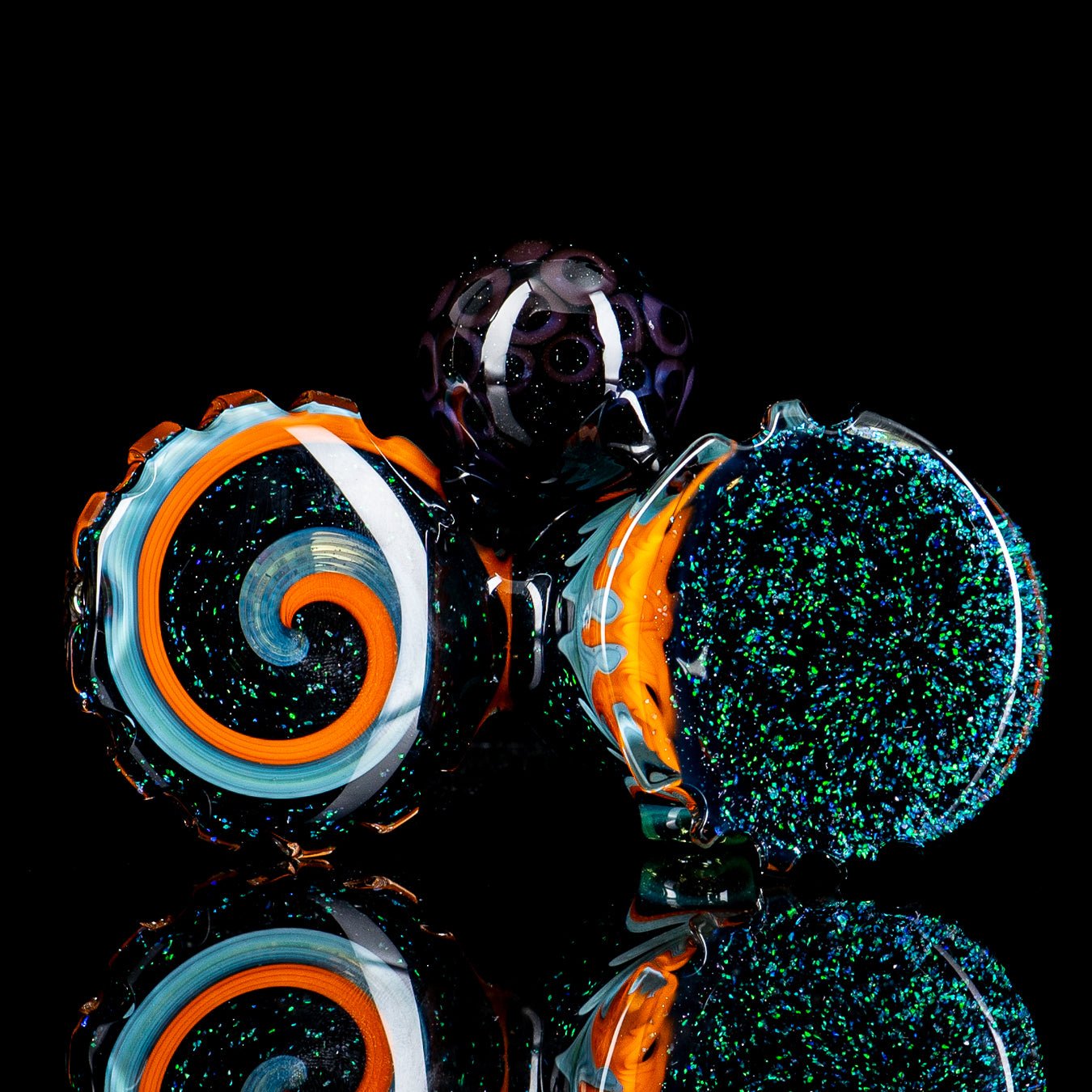 Dichro Pocket Heady Dottacello glass hand pipe by Rotational Science with colorful, reflective design and compact shape.