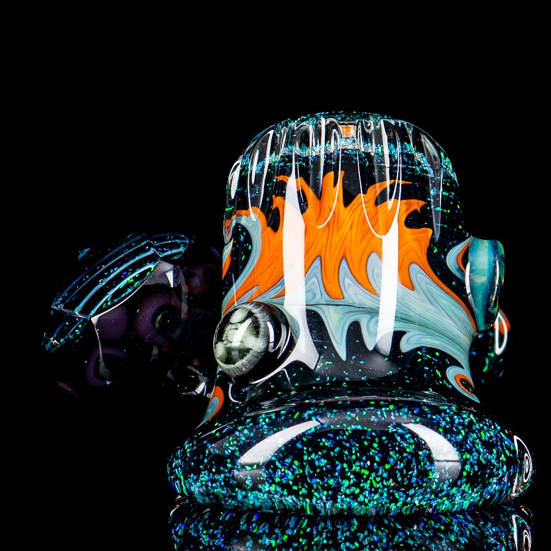 Dichro Pocket Heady Dottacello hand pipe by Rotational Science featuring colorful, reflective glass with intricate design details.