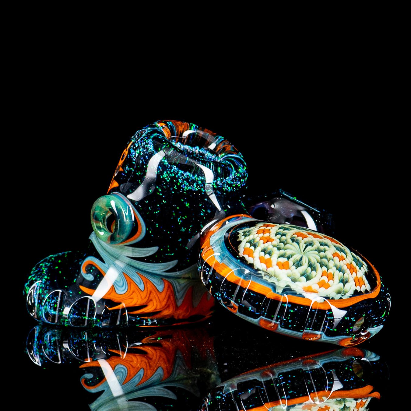 Dichro Pocket Heady Dottacello glass hand pipe by Rotational Science with colorful, intricate design and compact shape.