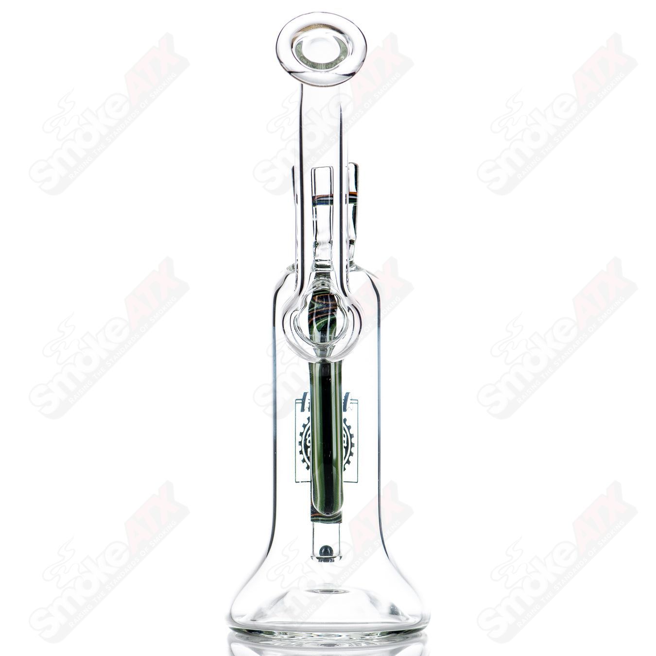 Glass diffusion pump by Steve Bates x WORM, a concentrate rig with intricate glasswork and a unique pump design.