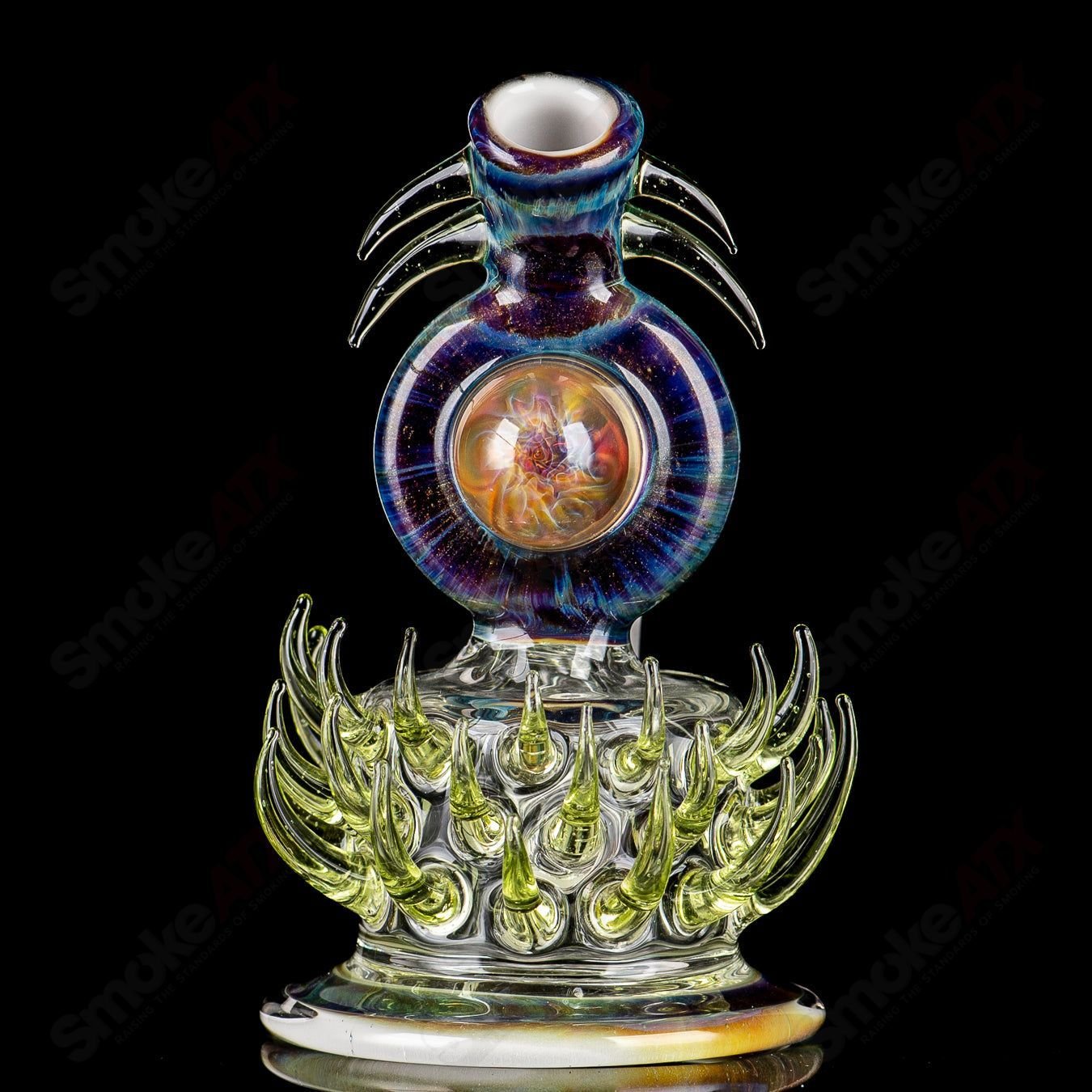 Colorful Freeek Glass disc rig with lime and purple accents, designed for concentrate use, showcasing a stylish heady glass piece.