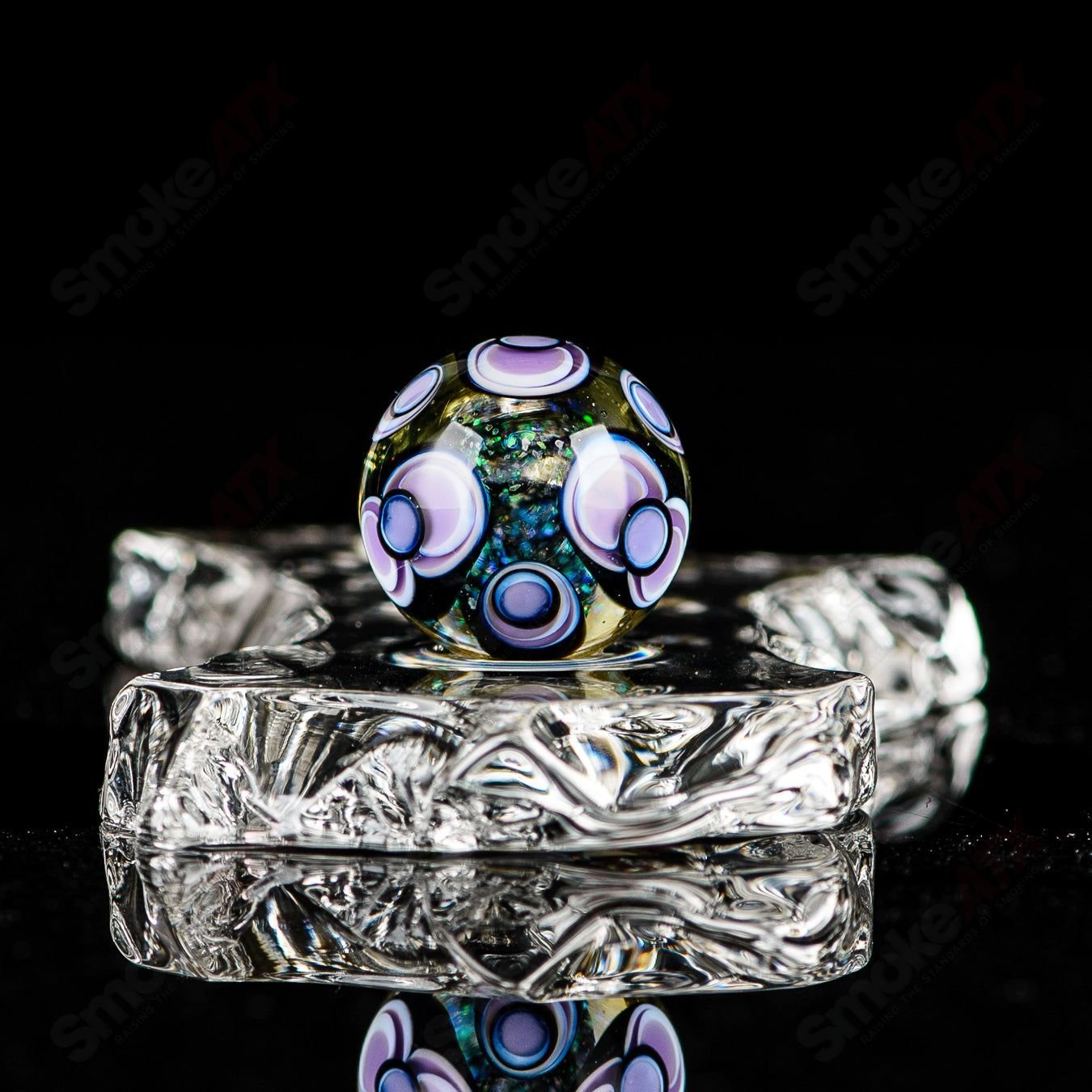 Colorful Indo Glass Dot Stacked Opal MIB marbles in Citrine, Lucy, Empire, Lotus, and Galaxy styles, made of glass.