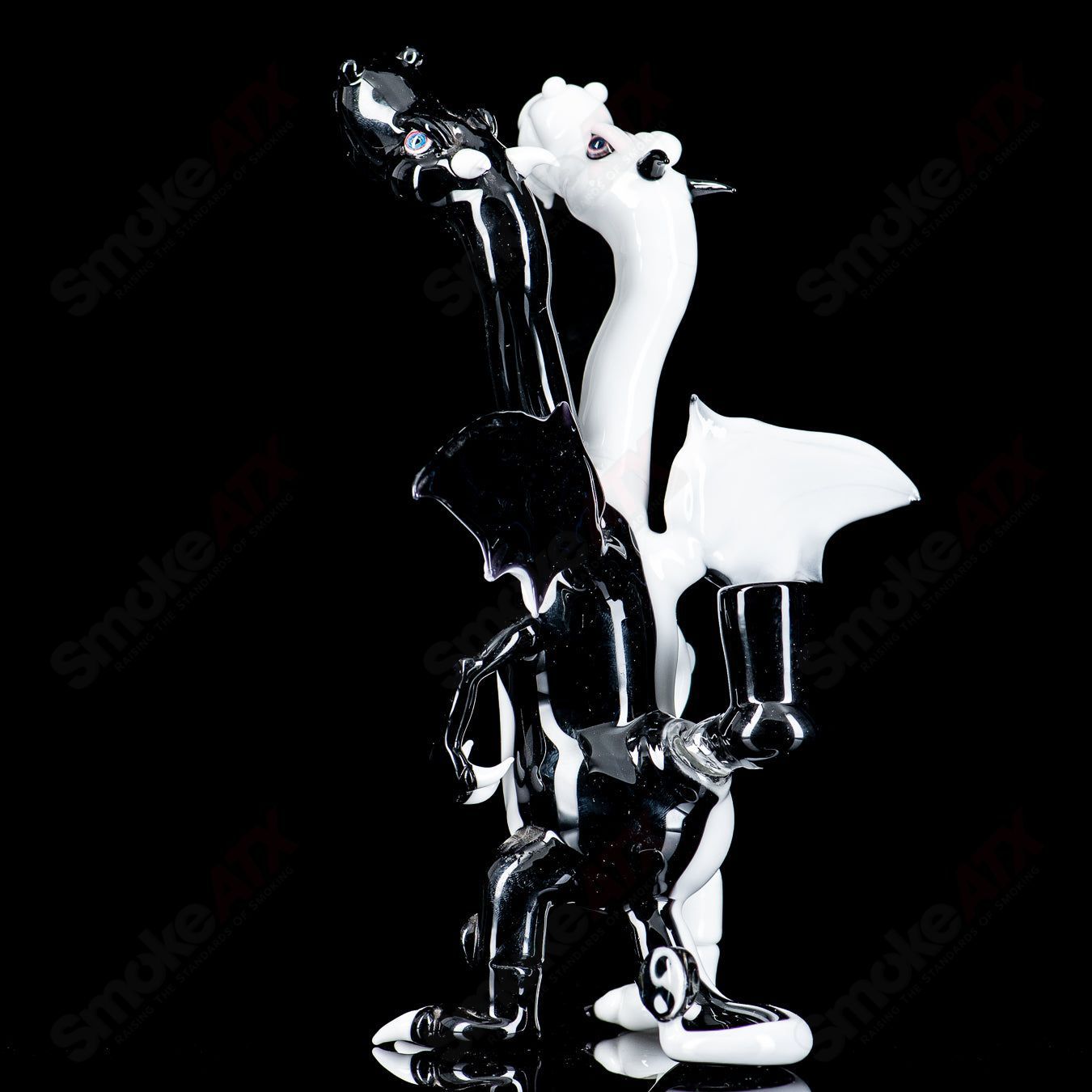 Hendy double-headed dragon heady glass concentrate rig with intricate dragon design and clear glass details.