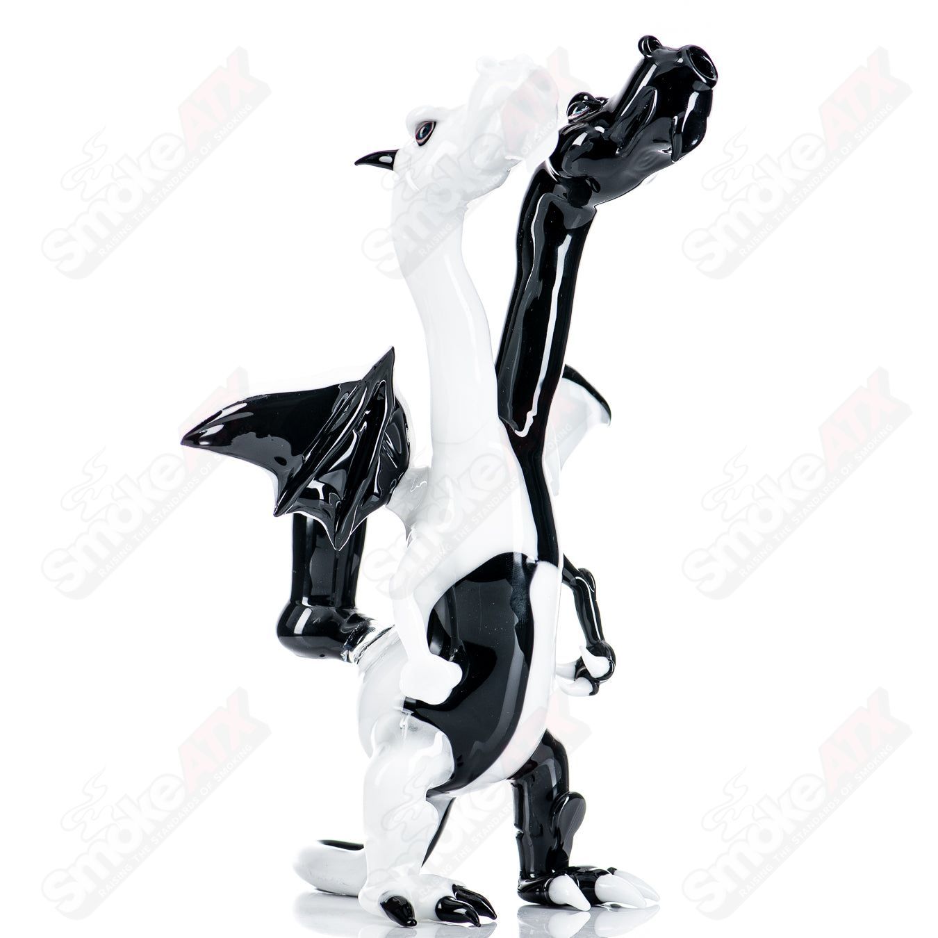 Hendy double-headed dragon heady glass concentrate rig with intricate dragon design and clear glass construction.