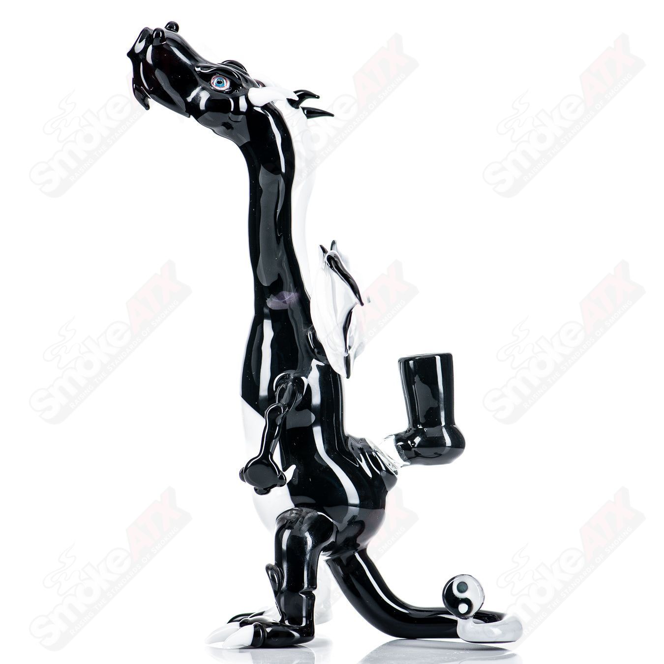 Double-headed dragon Hendy glass concentrate rig featuring intricate dragon designs and clear glass construction.