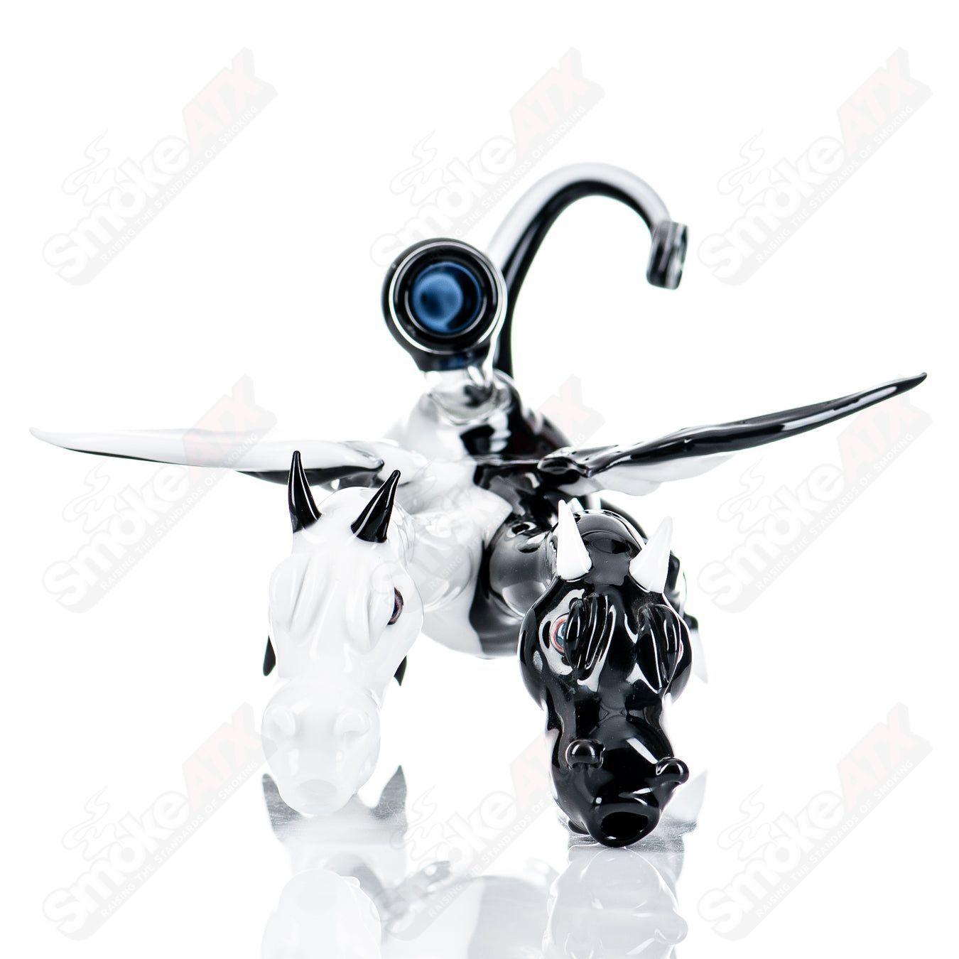 Double-headed dragon Hendy glass concentrate rig featuring intricate glasswork and vibrant colors, designed for dabbing.