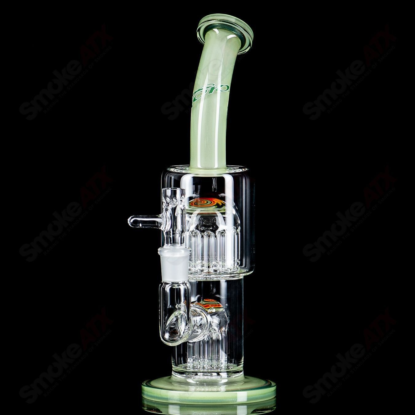 Toro Glass Double Micro 7/13 Arm Perc waterpipe with colorful sections and intricate glass design.