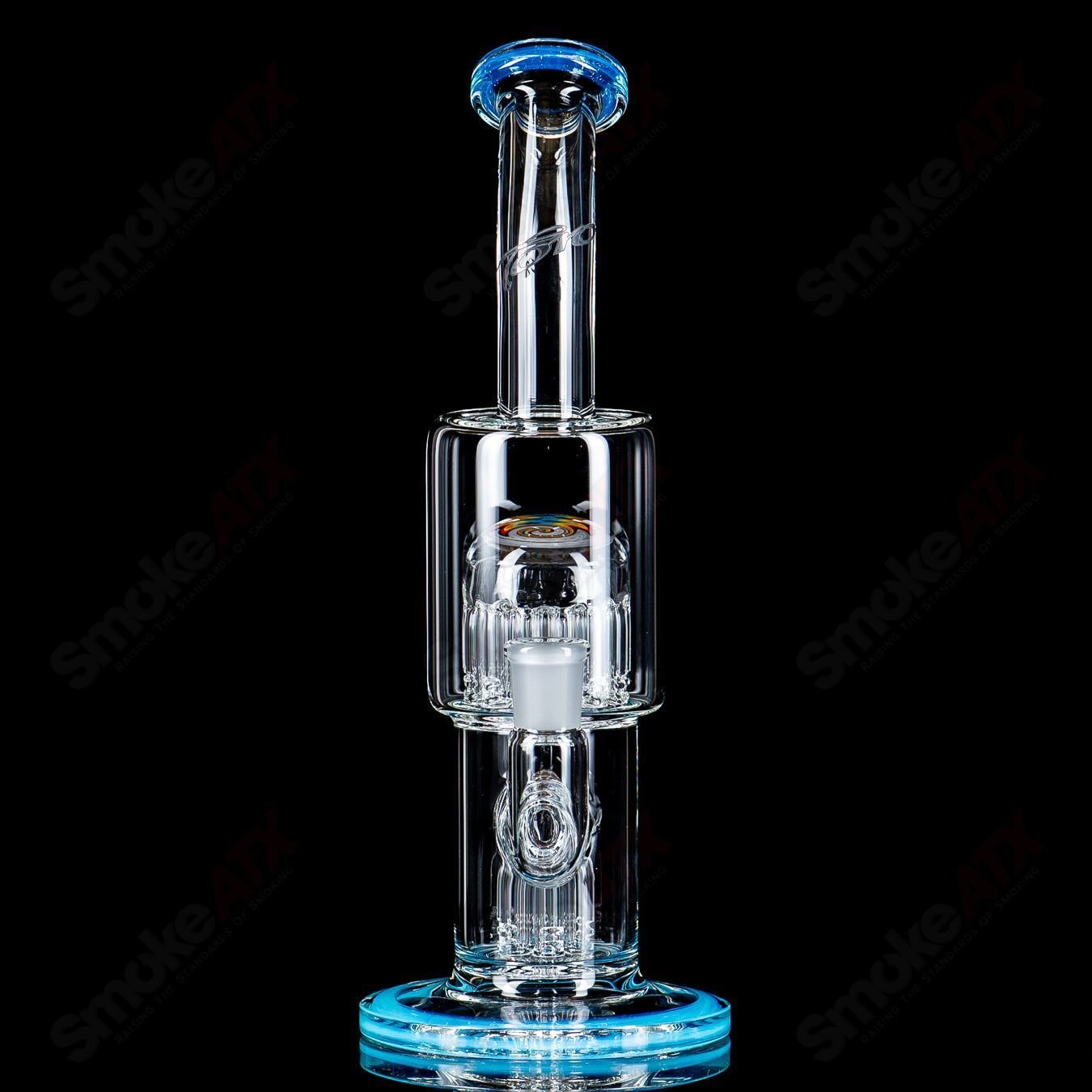 Toro Glass Double Micro 7/13 Arm Perc Bubbler with worked sections, showcasing intricate glasswork and detailed design features.