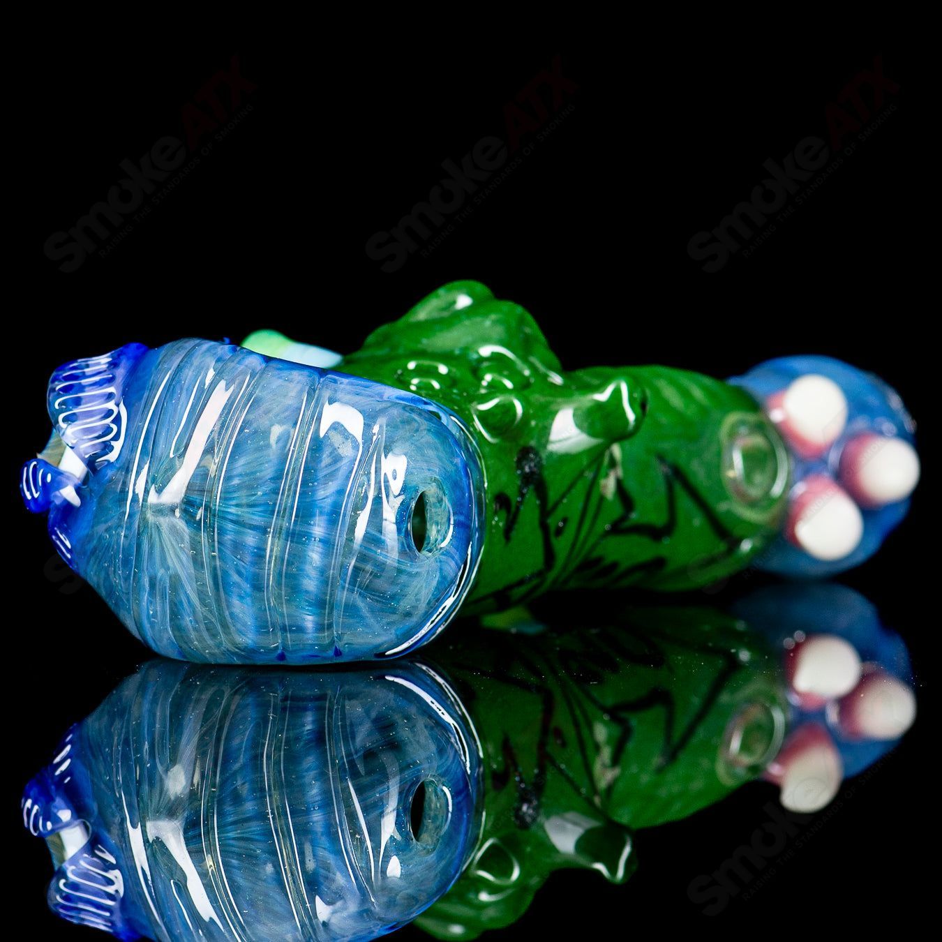 Salt Glass dry pipe with signed 2014 artwork, featuring colorful heady glass design and smooth hand pipe shape.