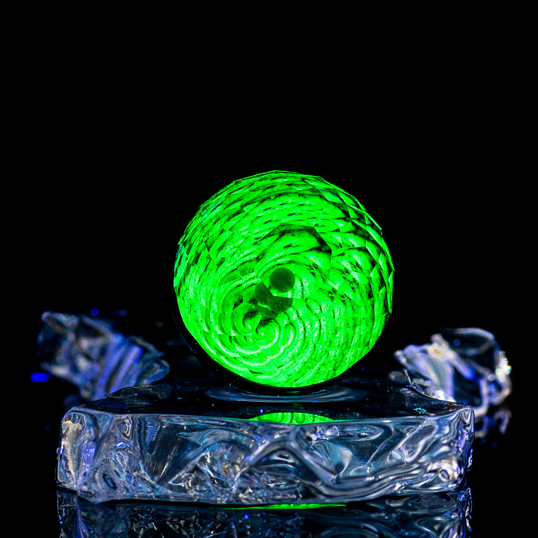 Colorful marble from Fatal Facets' Space Slurper collection, featuring intricate patterns and vibrant hues in heady glass.