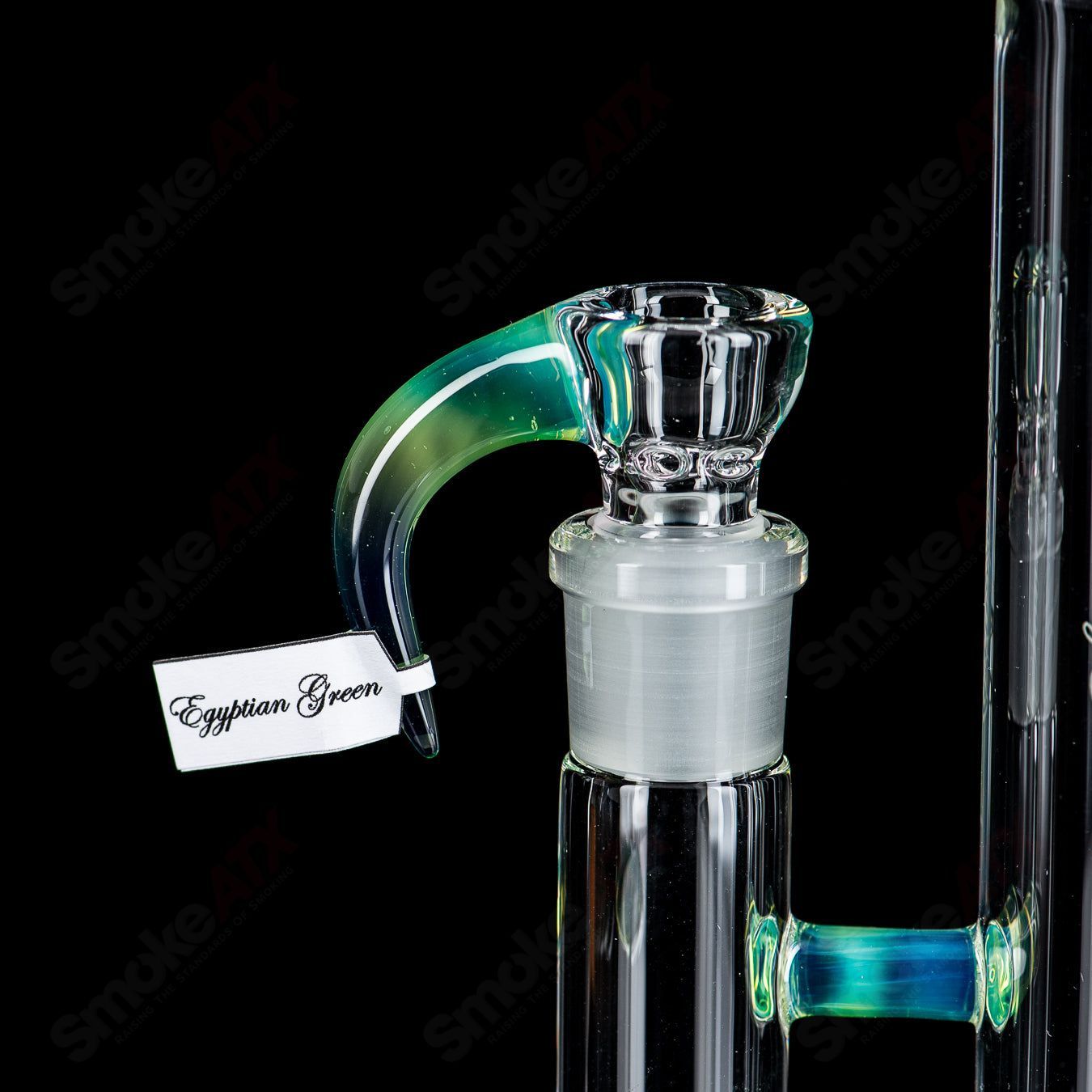 Egyptian Green Pawn with Down-grid Stemline by Sovereignty Glass, handcrafted heady glass piece with intricate green design.