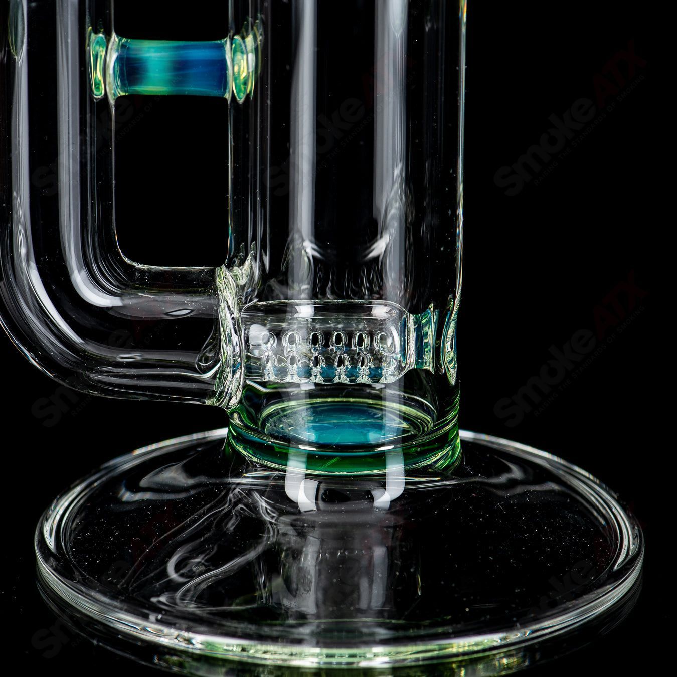 Egyptian Green Pawn Heady Glass pipe with Down-grid Stemline design by Sovereignty Glass, showcasing intricate glasswork and vibrant color.