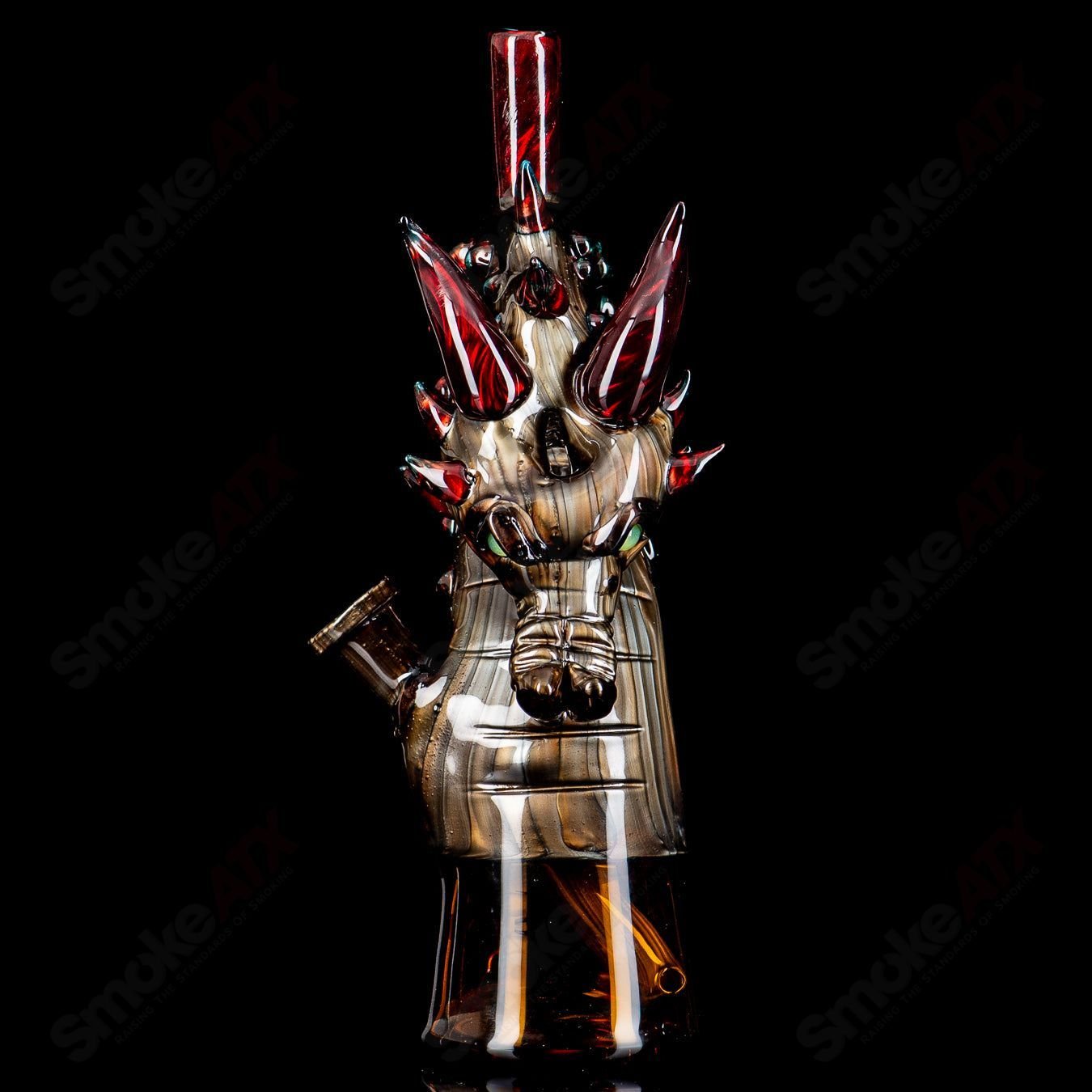 Electrum Dragon Rig by Tony Kazy, a heady glass concentrate rig with detailed dragon design and vibrant glasswork.