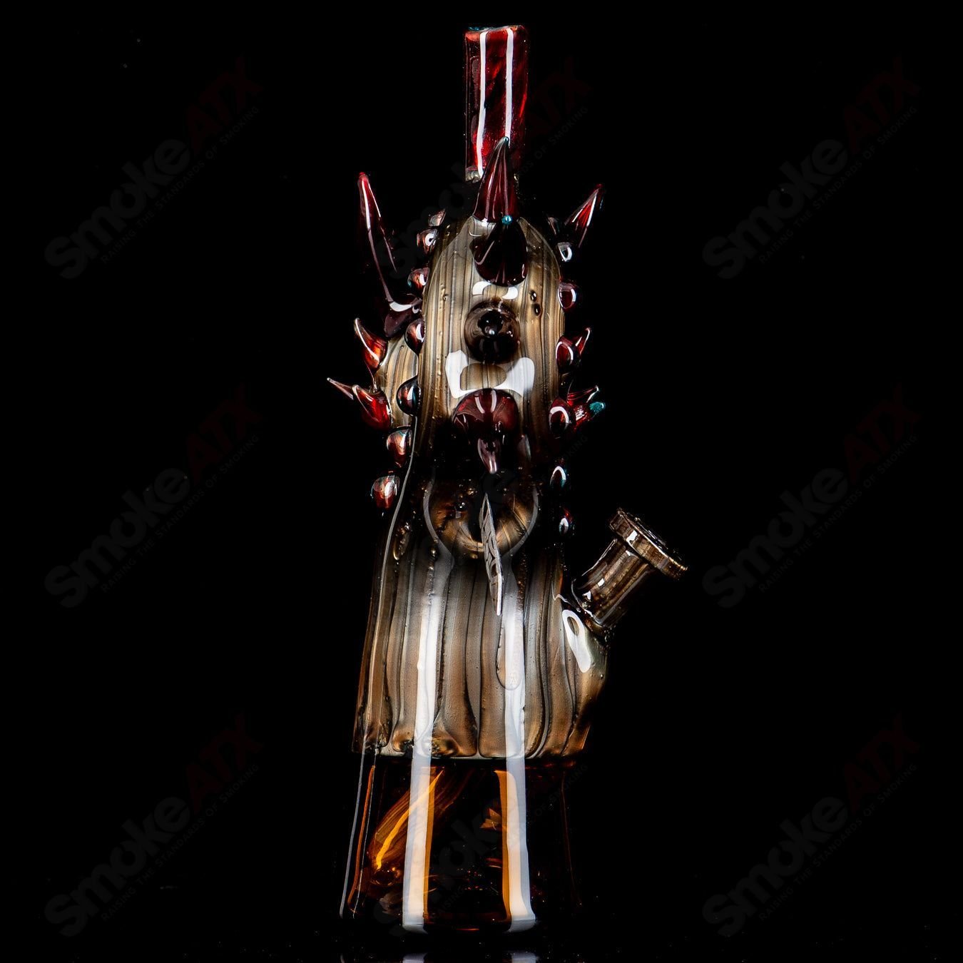 Electrum Dragon Rig by Tony Kazy, a clear Heady Glass concentrate rig with intricate dragon design and detailed glasswork.
