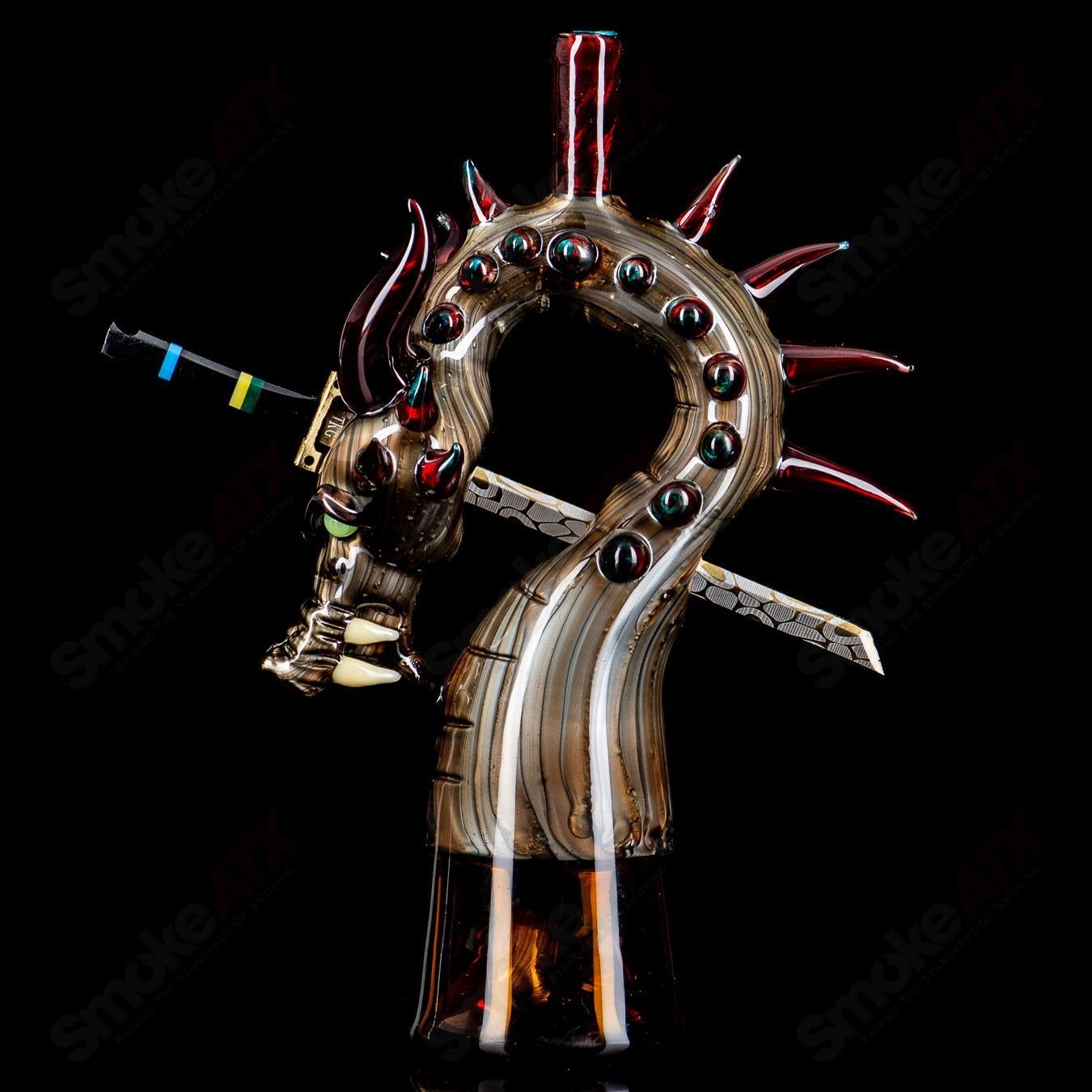 Electrum Dragon Rig by Tony Kazy, a heady glass concentrate rig featuring a detailed dragon design and vibrant glasswork.