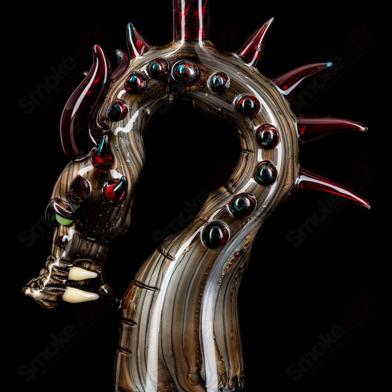 Electrum Dragon Rig by Tony Kazy, a colorful heady glass concentrate rig featuring a detailed dragon design.