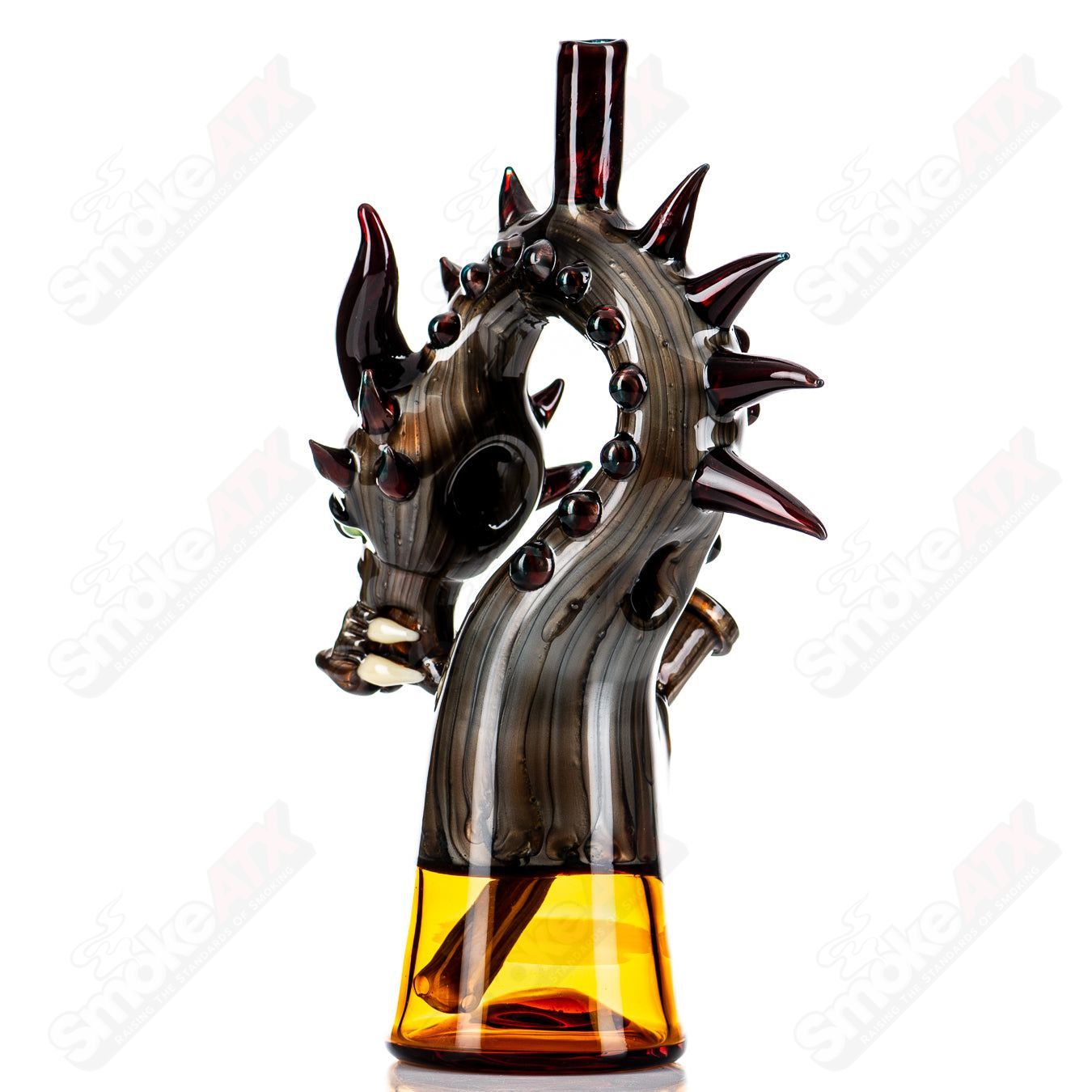 Electrum Dragon Rig by Tony Kazy, a colorful heady glass concentrate rig with intricate dragon design and vibrant glasswork.