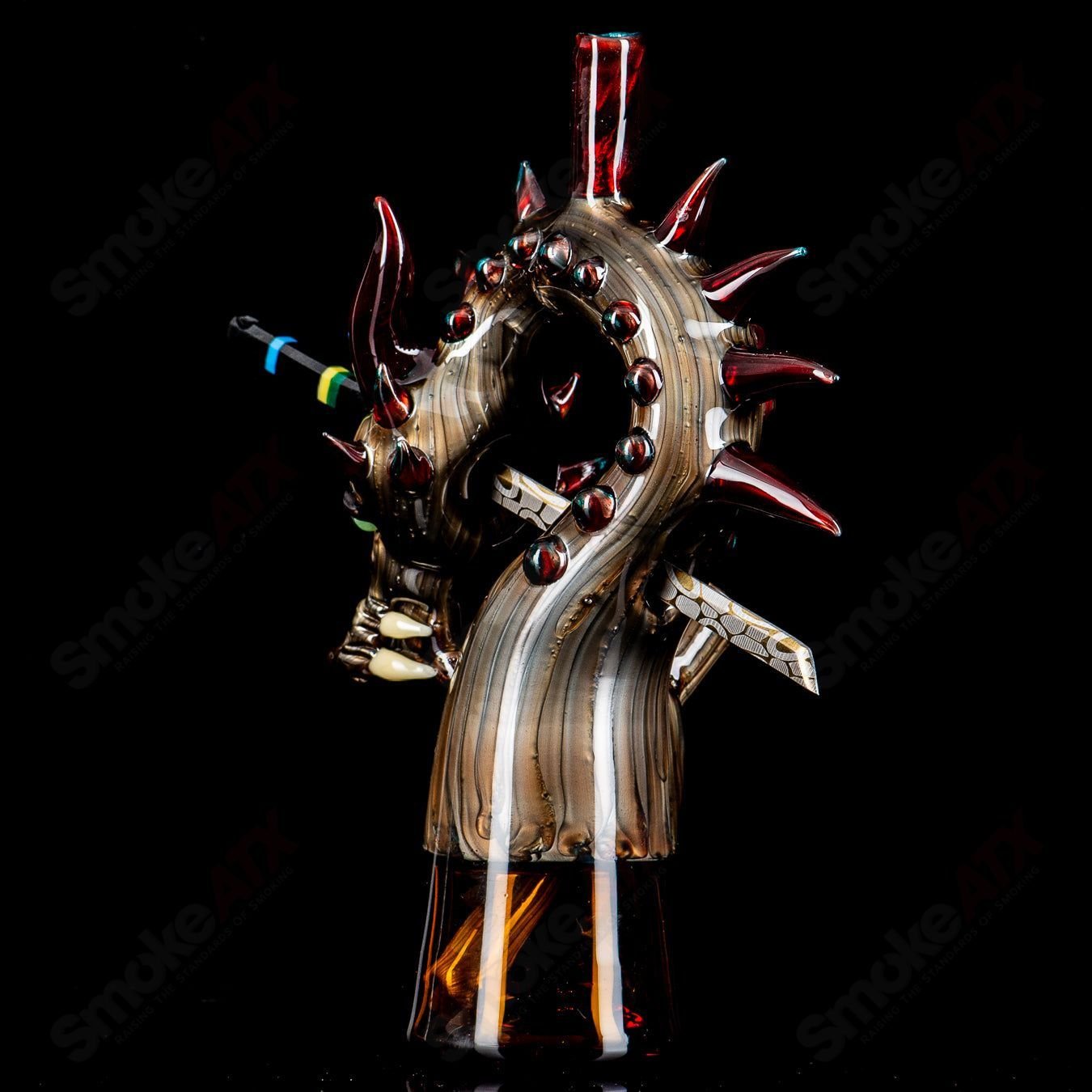 Electrum Dragon Rig by Tony Kazy, a colorful heady glass concentrate rig with intricate dragon design and vibrant glasswork.