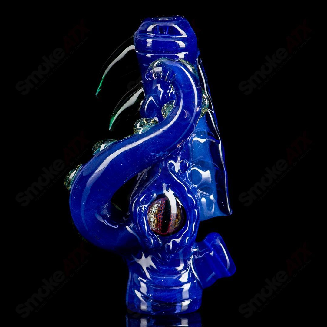 Mako Glass #5 Octopus Chillum made of clear glass with an octopus design, compact and transparent for easy use.