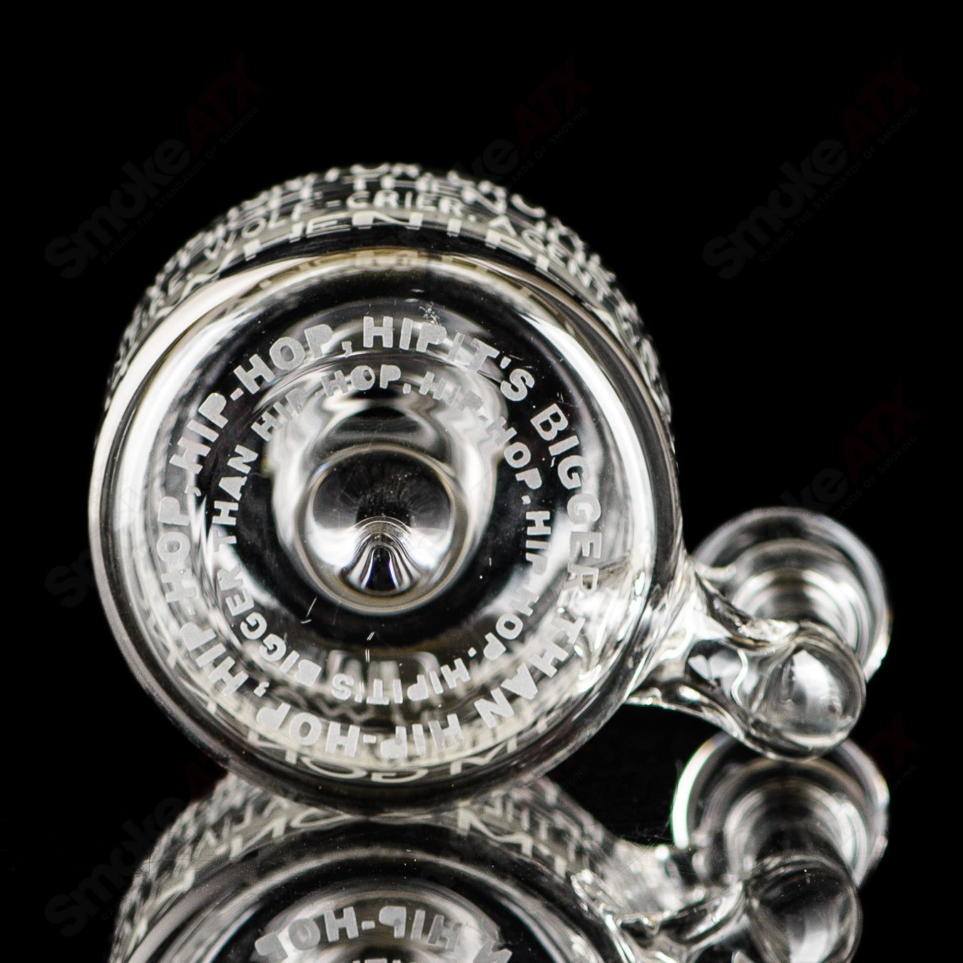 Kage Glass etched Lyric Rig for concentrate use featuring Dead Prez and hip-hop inspired design, made of clear glass.