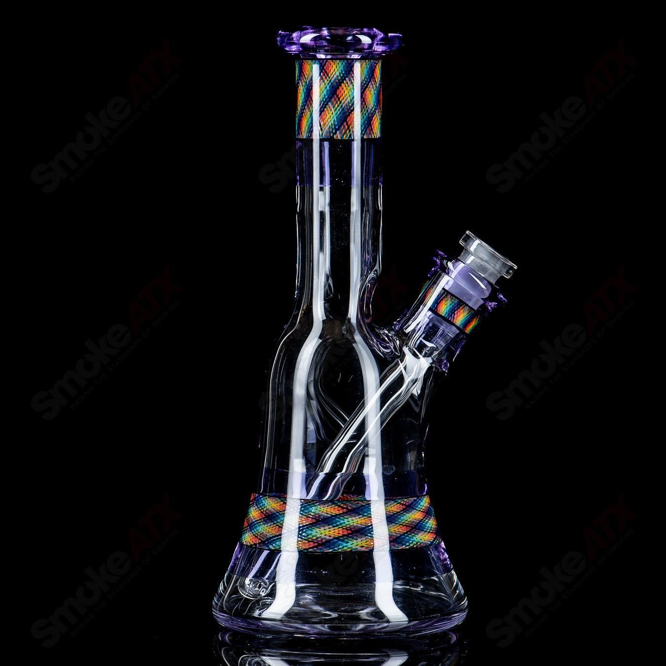 Devol Glass experimental 19-pocket Reticello tube waterpipe with intricate glasswork and colorful reticello design.
