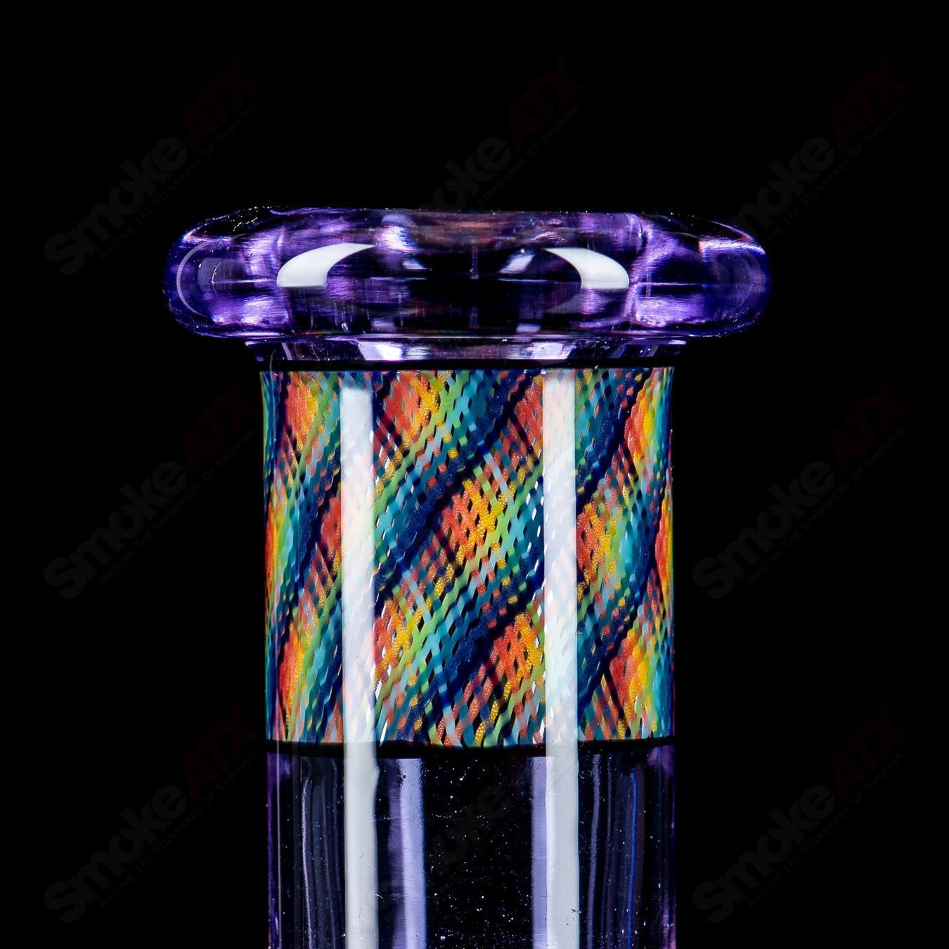 Devol Glass experimental 19-pocket reticello tube, a colorful heady waterpipe with intricate glasswork and vibrant design details.