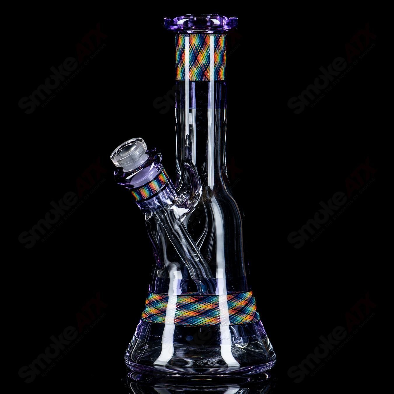 Devol Glass Experimental 19 Pocket Reticello Tube waterpipe with intricate glasswork and vibrant color accents.