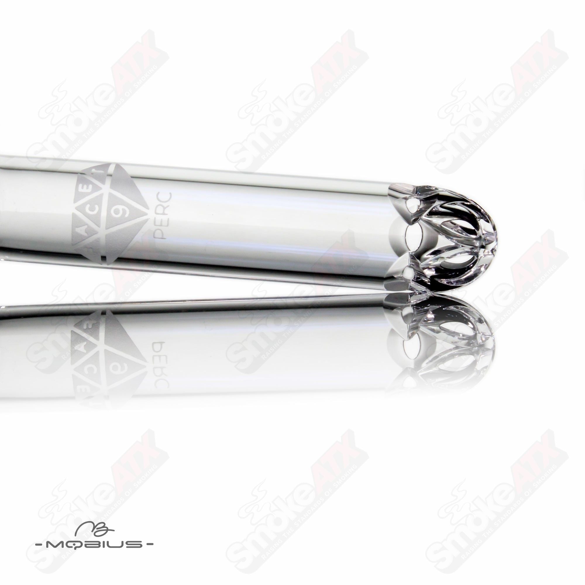 Glass Mobius Facet 3.75-inch downstem, clear with diamond-patterned design, for enhancing smoking experience.